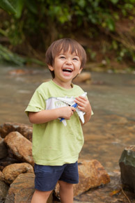 Brian / We play a lot in the rivers next to our house, building dams, throwing rocks, and flying airplanes