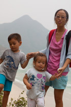 Climbing up the cliff above Tai Wan Beach, to get out of the rain