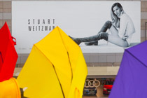 Youth behind umbrellas, Tycoons behind brands, Government behind Tycoons