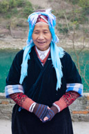 Miao minority lady selling yarn at ShiLi GuXia market