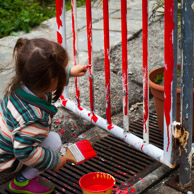 Valorie and the other the neighbor kids randomly painted swaths of the neighborhood, neighborcloths, neighborhair and neighbordogs with the indelible epoxy and linear polyurethane colors of my surf ski.