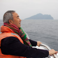 Baba looking at a volcano