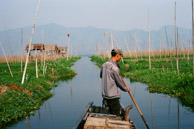 SanRei pushing our boat in shallow water (35mm Kodak Ektar 100)