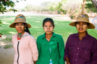 Golf Caddies.   Girls and boys in Burma where wet tree bark saw dust as makeup.(35mm Kodak Portra 160)
