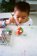 Brian making owls out of rocks at summer school (Kodak Ektar 100)