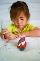 Valorie making owls out of rocks at summer school (Kodak Ektar 100)